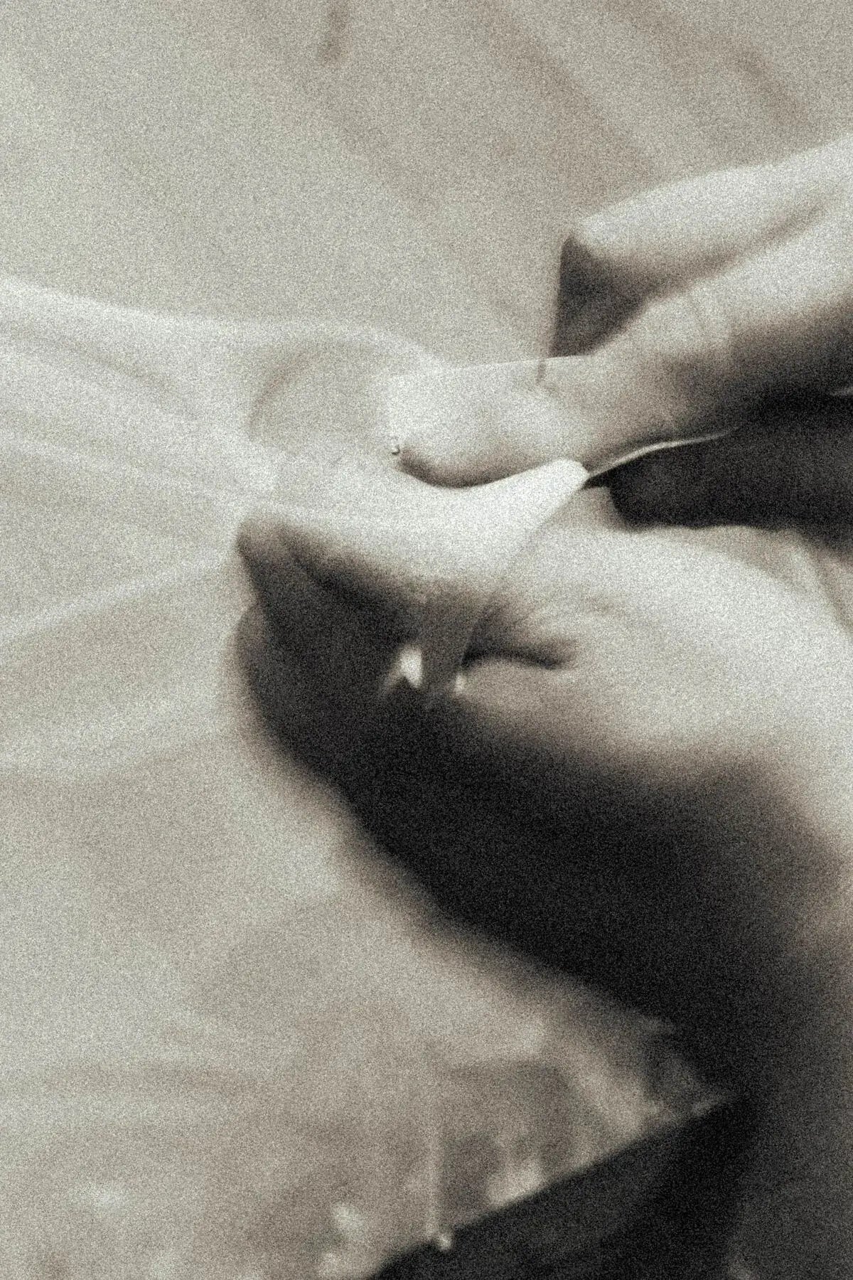 Hands finishing a frame