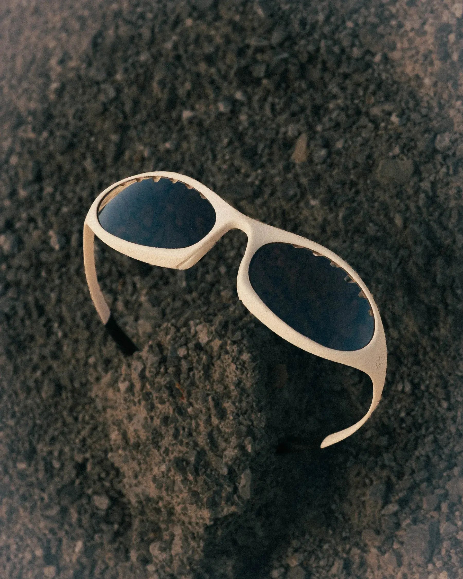 Through Everything frame in white with dark lenses